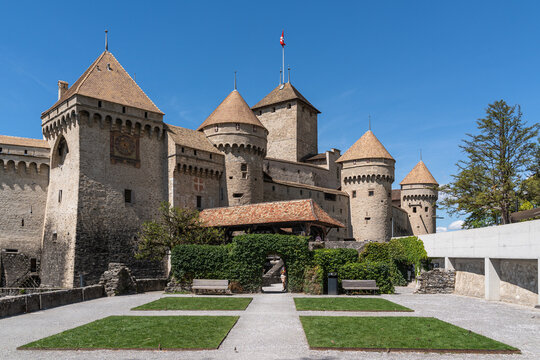 View of Chillon Castle, a popular tourist landmark located on the shores of Lake Geneva near Montreux. Veytaux, Switzerland, Aug. 2022