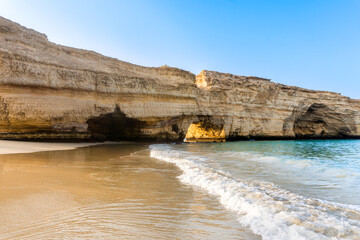 Fototapeta na wymiar Beautiful landscape of Muscat coast with sandy beach and rock, Oman