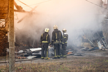 The work of firefighters on fire. Fighting fire in case of a building fire.