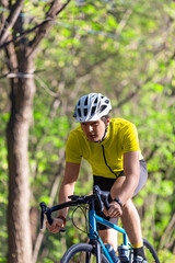 Young athlete during a bicycle race - vertical photo.