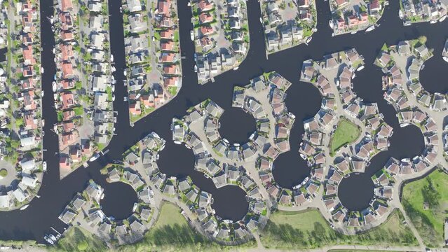 Top down view of symmetrical pattern of leisure housing in a harbour in Lemmer, Friesland, the Netherlands.
