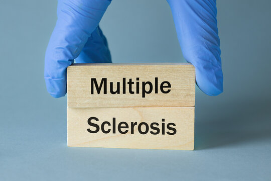 Multiple sclerosis (MS) a disease that affects the nervous system, Written on wooden blocks, Health concept, detection and treatment of rare diseases