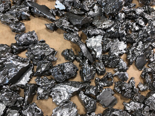 A pile or iron meteorites close up. 
