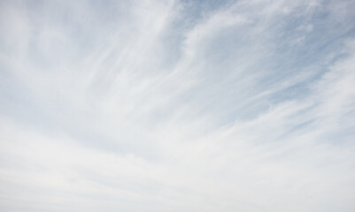 a breathtaking view of the sky with feathery clouds
