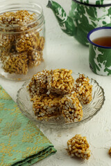 Rice popcorn or brondong, a traditional Indonesian food made from rice coated with sweet brown sugar