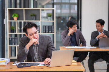 Concept Burnout Syndrome. Businessman feels uncomfortable working. Which is caused by stress, accumulated from unsuccessful work And less resting body. Consult a specialist psychiatrist.