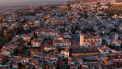Aerial view of Granada city, Albaicin district at sunset, old Moorish quarter of the city, located on a hill facing the Alhambra. Andalusia, Spain