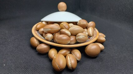 Some seeds of Argan on a Black Background