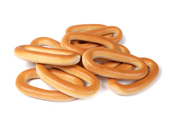 Delicious dry bagels isolated on white