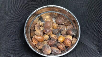 Some seeds of Argan on a Black Background