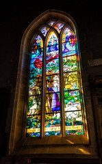 Ancient Glass Window In Church Notre-Dame De La Tronchaye In Picturesque Village Rochefort En Terre In The Department Of Morbihan In Brittany, France