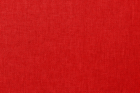 Dark red linen fabric cloth texture background, seamless pattern of natural textile.