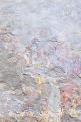 Old brick wall with  plaster falling apart