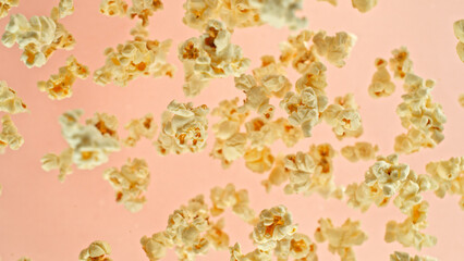 Freeze motion of flying popcorn up in the air.