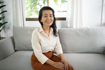 Obraz premium Portrait of Middle age Asian woman. smiling Beautiful mature&nbsp;asian woman. business lady