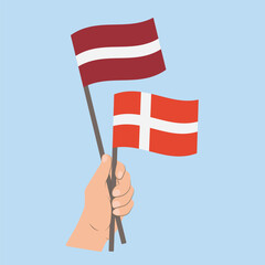 Flags of Latvia and Denmark, Hand Holding flags