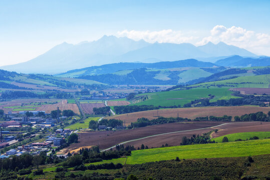scenic rural tatra mountain landscape in slovakia. agricultural fields in the valley