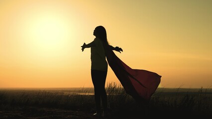 Superhero girl cloak cape super brave sunset. sky sun run child dream running happy free. hero...