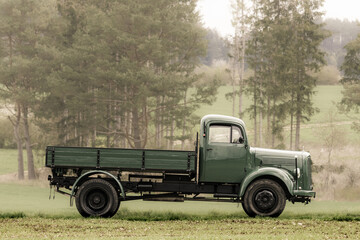 Classic oldtimer vintage truck on a country road