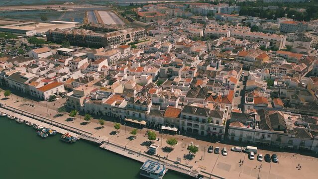Aerial view of buildings beside the river in Tavira, Portugal