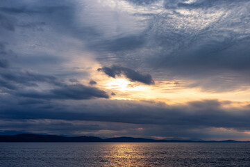 Fototapeta na wymiar Cloudy Cloudscape during stormy everning on the West Coast of Pacific Ocean. British Columbia, Canada. Sunset Sky