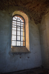 Fototapeta na wymiar window arch in an abandoned temple