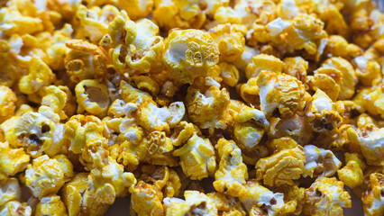Background and texture of yellow popcorn.