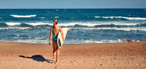 Couple of surfers on the beach