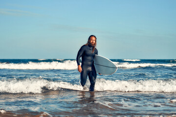 Couple of surfers on the beach