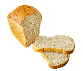 loaf of white wheat bread sliced on white background