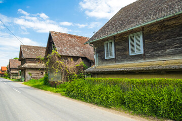 Fototapeta na wymiar Typical wooden house in the village Krapje in nature park Lonjsko Polje in Croatia