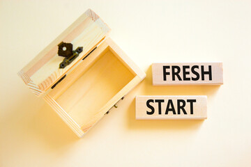 Fresh start and motivational symbol. Concept words Fresh start on beautiful wooden block. Beautiful white background. Empty wooden chest. Business motivational and Fresh start concept. Copy space.