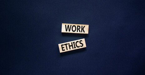 Work ethics symbol. Concept words Work ethics on beautiful wooden block. Beautiful black table black background. Business and Work ethics concept. Copy space.