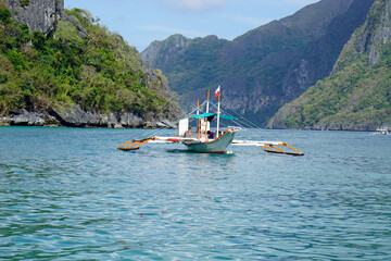 Fototapeta na wymiar traditional wooden outrigger boats on palawan island