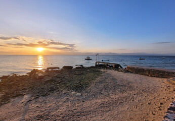 scenic sunset over the pacific ocean at moalboal cebu island