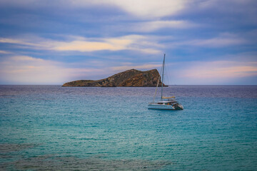 Beautiful sandy Cala Comte beach with azure blue sea water, Ibiza island, Spain