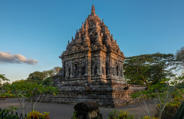 Fototapeta na wymiar Ancient temple ruins of Bubrah (candi Bubrah), a 9th-century Buddhist temple located within the complex of the Prambanan Temple Archaeological Park, in Central Java, Indonesia.