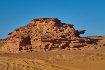 big red rocks in  the desert of algeria