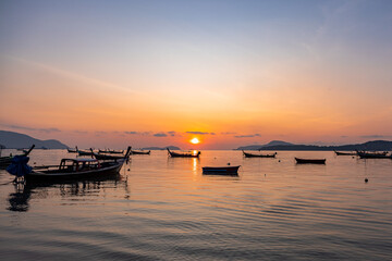 sunset on the sea. Sunset over Rawai Bay in Thailand.