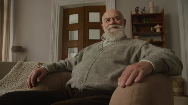 Old Man Portrait, wide angle shot grandpa looking at camera and laugh