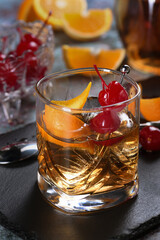The Irish redhead. The cocktail is made from whiskey, grenadine syrup, soda water, lemon or lime juice, garnished with cherry garnish and orange zest, served in a scotch class with ice. An ideal aperi