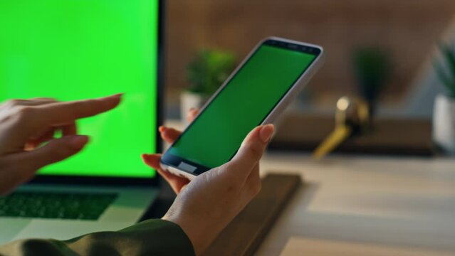 Businesswoman using mockup devices at workplace closeup. Hands typing laptop 