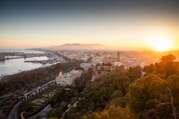 view over Malaga at sunset travel banner