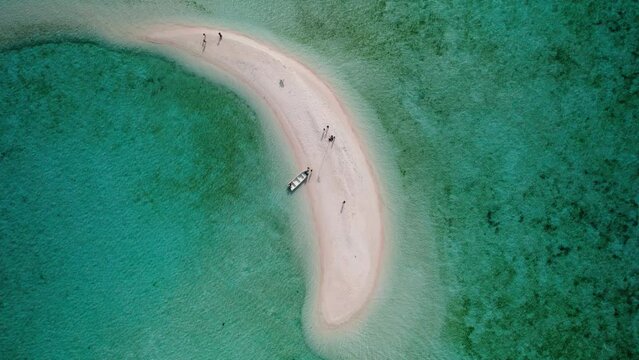 Aerial video on Snake Island Indonesia Aerial view showing boats and tourists enjoying Snake Island