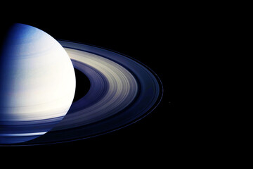 The planet Saturn on a dark background. Elements of this image furnished NASA.