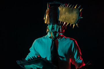 Male cosplayer dressed up as an anime character. Concept of anime cosplay in a studio with smoke.