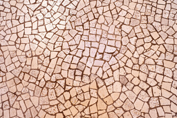 Beautiful cobblestone pavement made out of uneven paving stones.