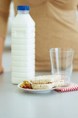 Closeup on breakfast of young woman in kitchen