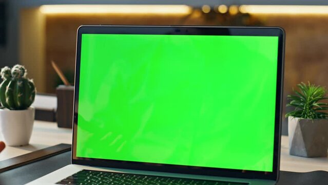 Man chatting greenscreen computer in workplace closeup. Worker having conference