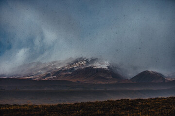 Mountain autumn landscape during the storm hailed, Kyrgyzstan